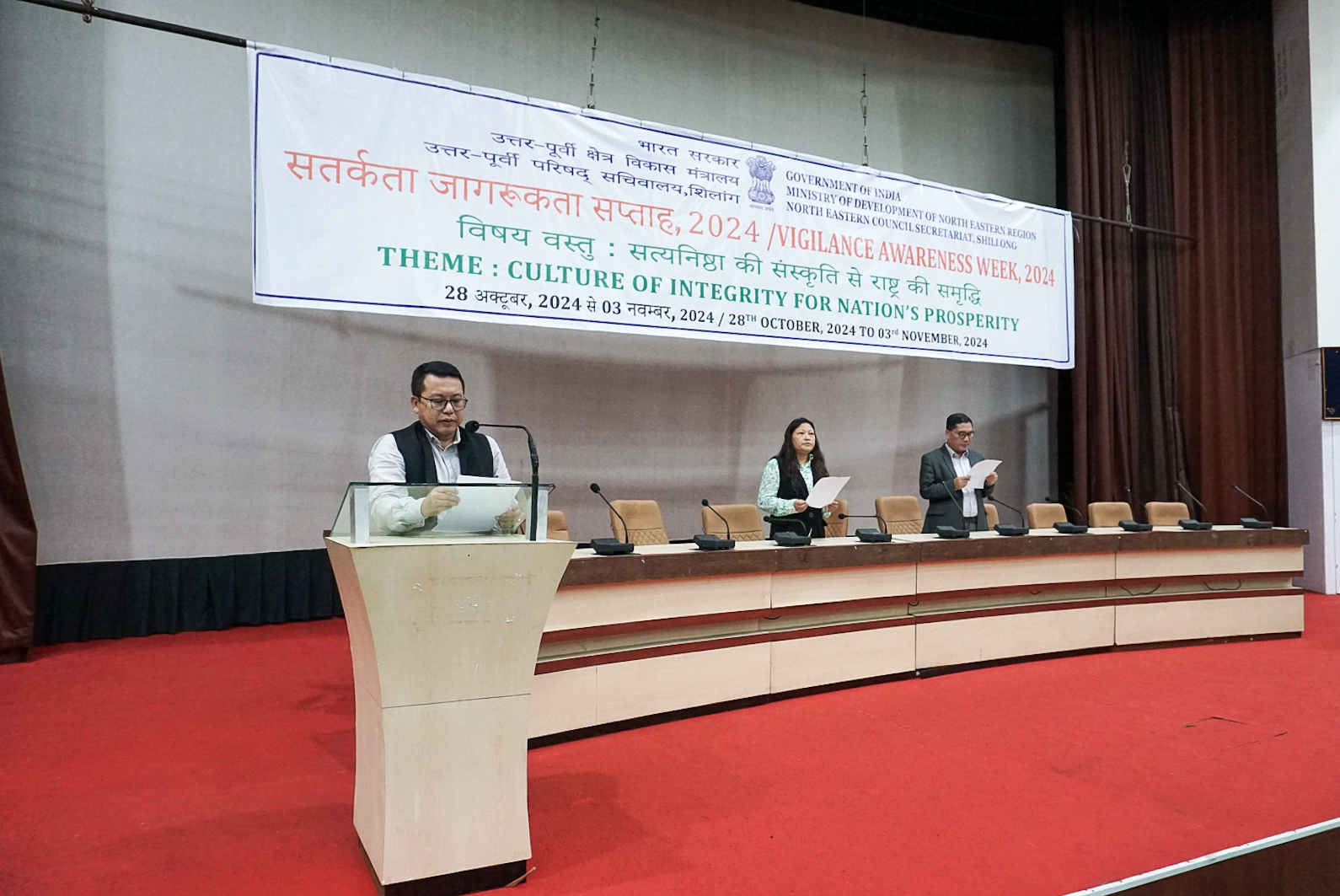 Shri Som Kamei, Planning Adviser, NEC, administering the Int