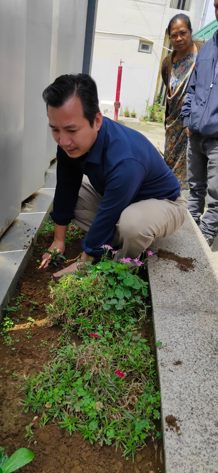 Assistant Secretary Sh. Bamin Tarang planting a sappling of