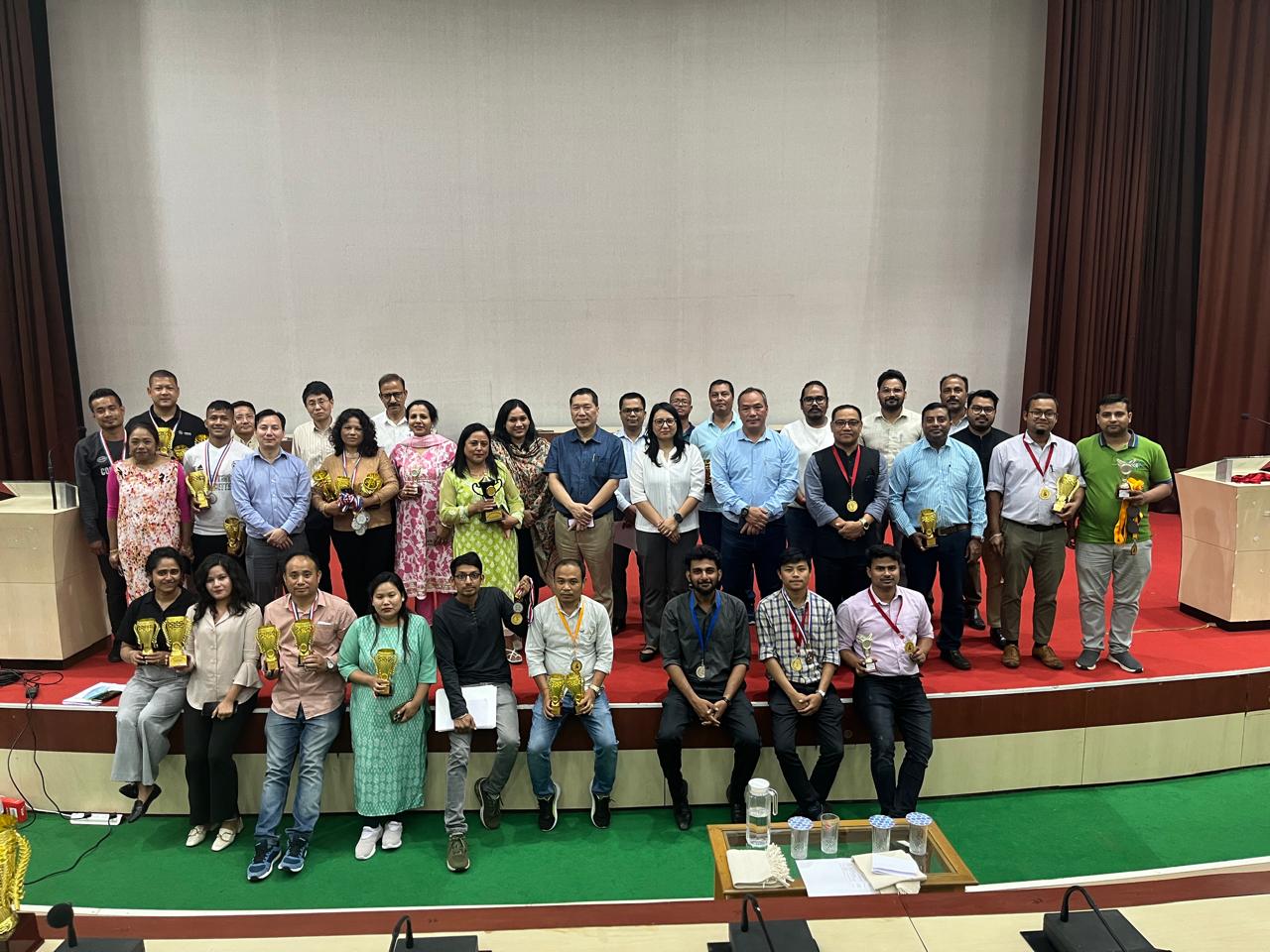 Group photograph of NEC Officers and Staff after the prize d