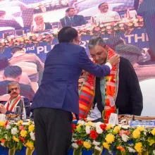 Angshuman Dey, Secretary, NEC, felicitating Mr. Chanchal Kum