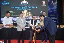 The ceremonial lamp is being lighting by Dr. S. P. Agarwal,